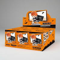 Box of 'Haikyuu!!' figurines with character illustration on an orange background