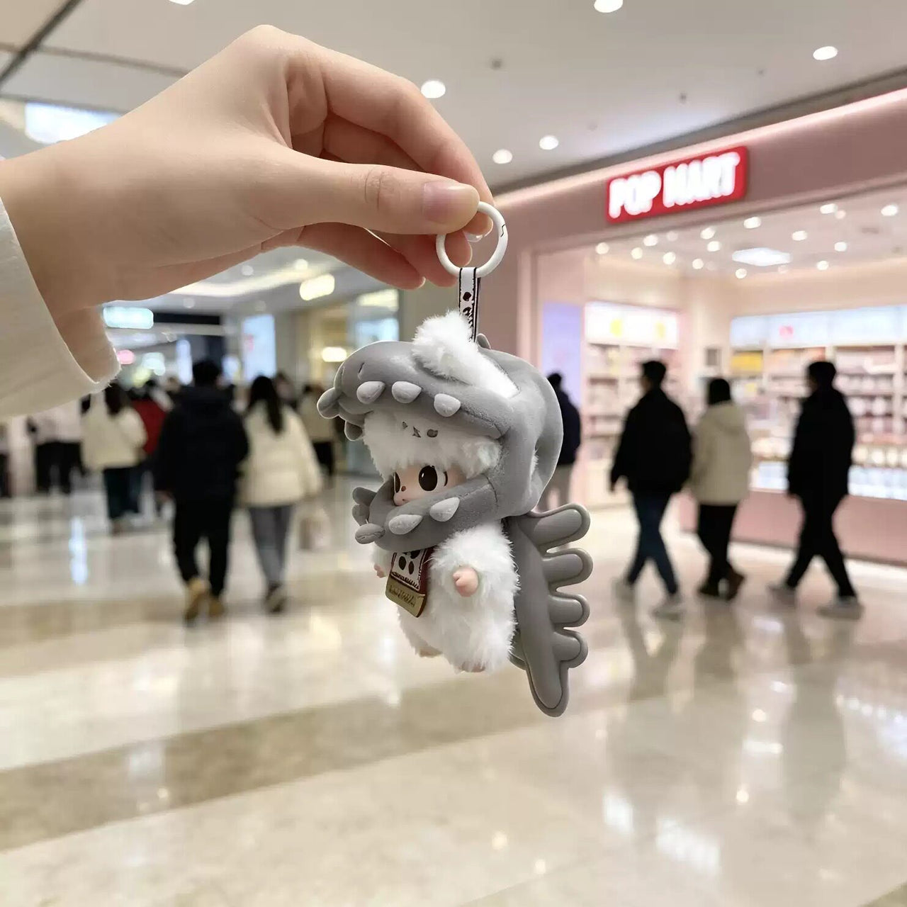 Pop Mart DIMOO and Labubu dinosaur skeleton plush bag charm keychains with detailed bone design