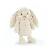 Jellycat Star Ear Bunny plush soft toy in white with gray accents, featuring star-shaped ears and a cuddly, fuzzy texture.