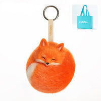 Kudoll Sleeping Fox plush keychain with red and white fox design, soft fabric, and cute charm for bags or keys.