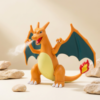 Nintendo Pokémon Charizard rechargeable mist figure in rocky display scene with water mist