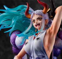 Anime character figurine with blue hair and red horns against a dark background