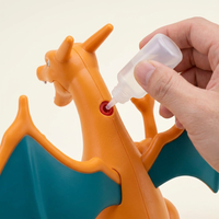 Nintendo Pokémon Charizard rechargeable mist figure with squeeze bottle filling the water port