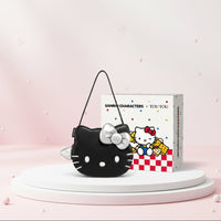 Hello Kitty handbag with packaging box featuring Sanrio characters on a white background