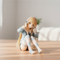 Figurine of a character with blonde hair and headphones sitting on a wooden surface.