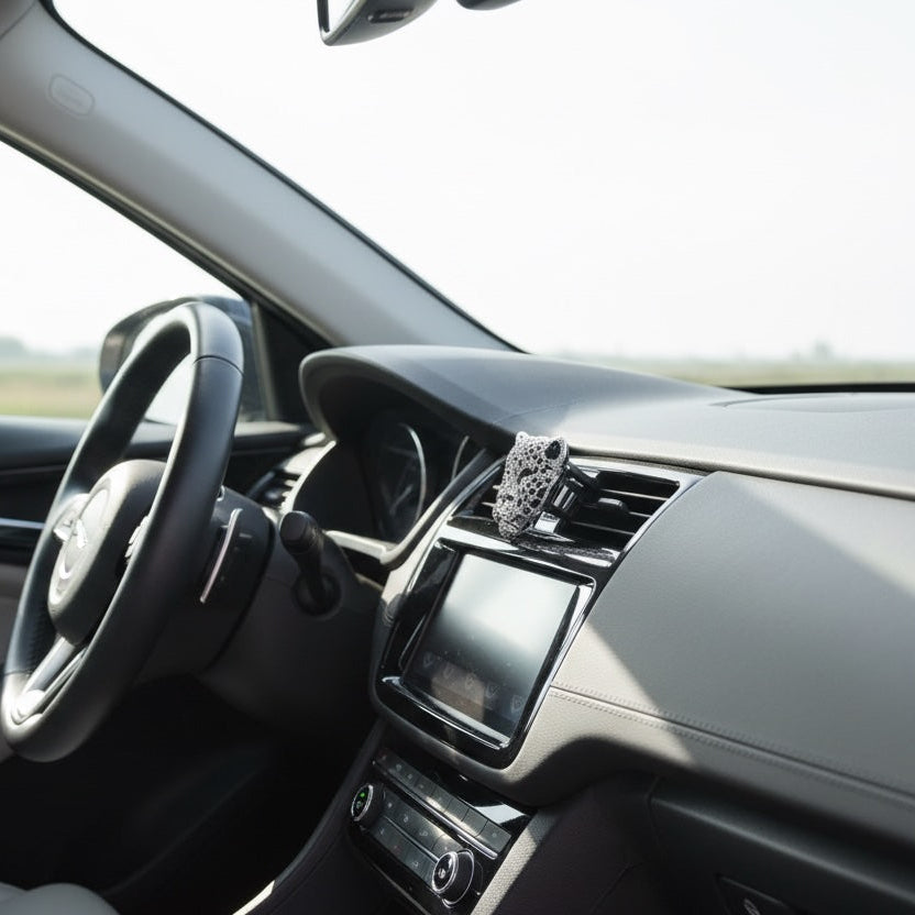 Car interior with steering wheel and dashboard view